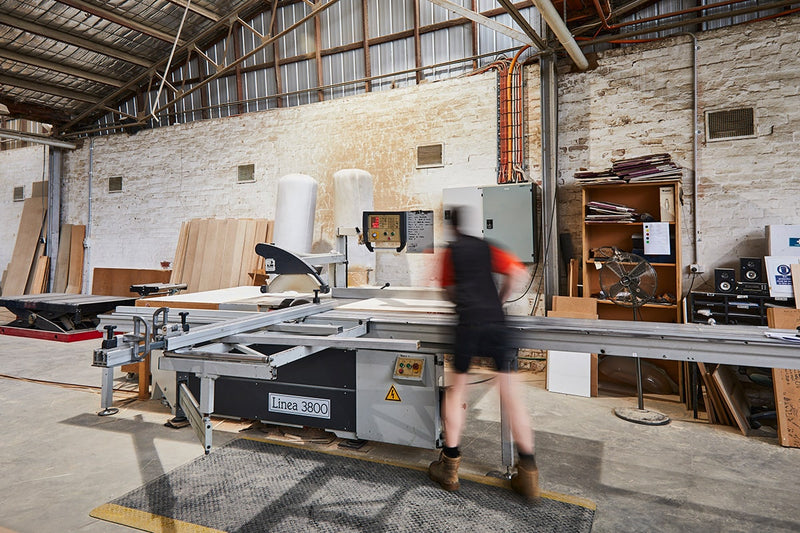 Panel saw operator at local Melbourne plywood store, Plyco, cuts mdf board to size