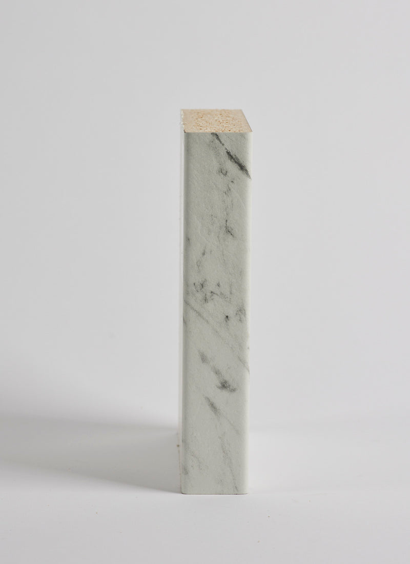 Edging view of Plyco's new EGGER worktop/benchtop laminate in White Carrara Marble on a white background