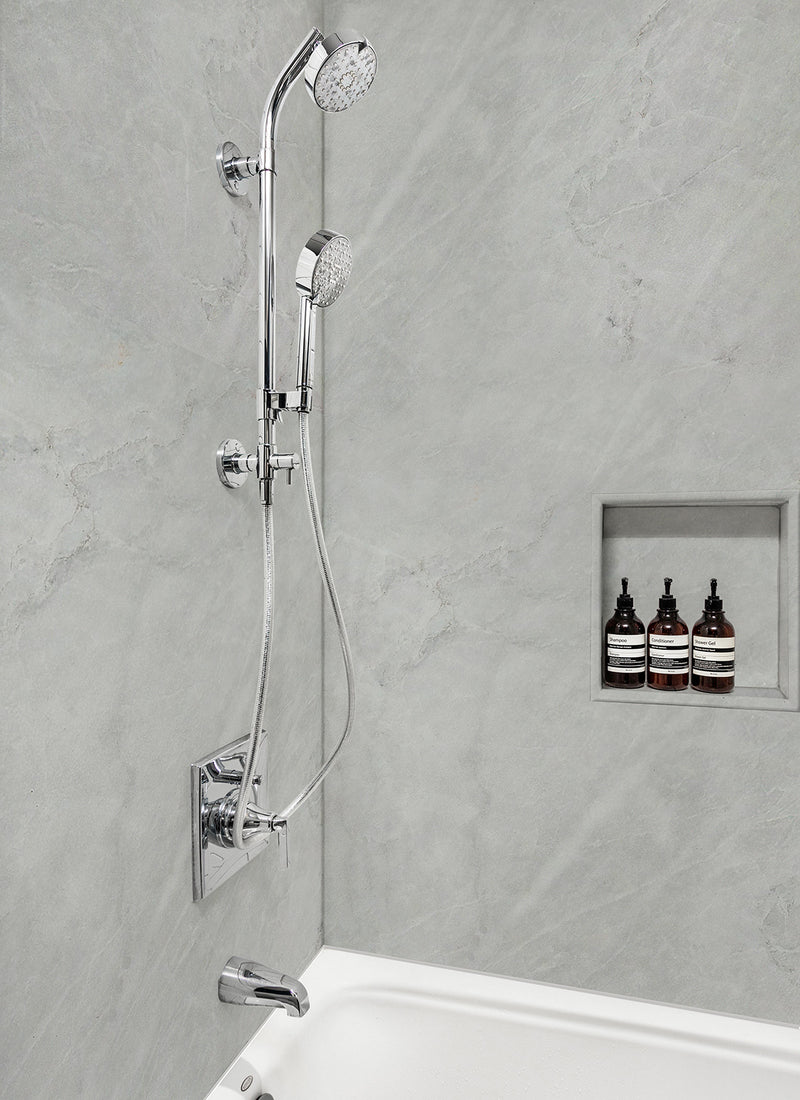 A residential shower featuring Forest One's White Carrara Ice WallART Wet Area Panel from Plyco without a white background
