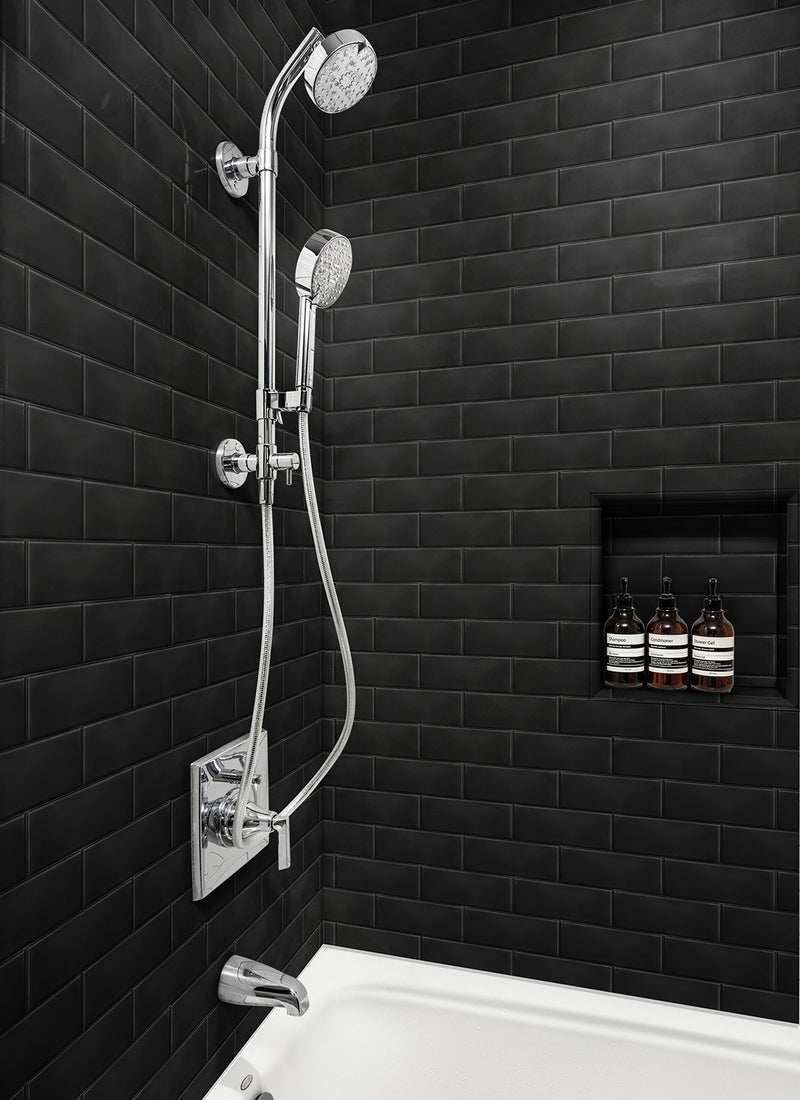A residential shower featuring Forest One's New York Black Tiled WallART Wet Area Panel from Plyco without a white background