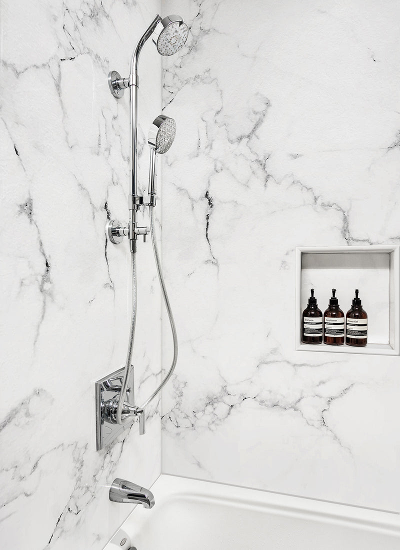 A residential shower featuring Forest One's White Marble WallART Wet Area Panel from Plyco without a white background