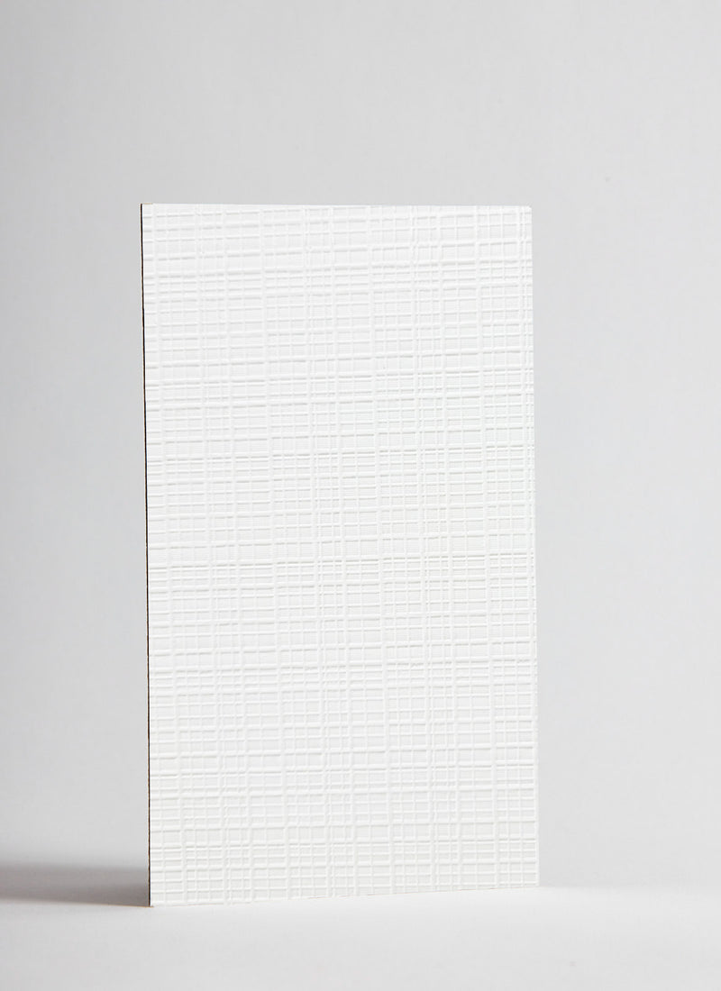 Product shot of Plyco's 3mm White Embossed Polyester Plywood on a white background