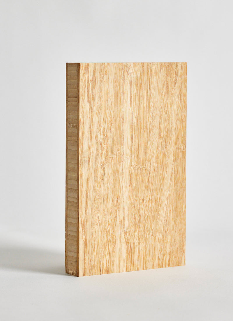 Plyco's Bamboo Strand Woven Natural Plywood with a white background