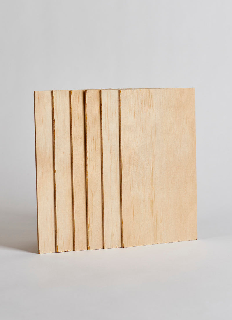 Plyco's 3mm Radiata Walnut Laserply Craft Pack, containing six sheets, on a white background