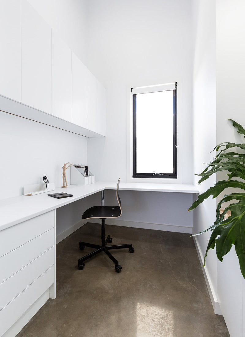 Melbourne plywood supplier Plyco's Satin 18mm White Melamine MDF (High Moisture Resistant) used as cabinetry and a desk in a home study project with a white background
