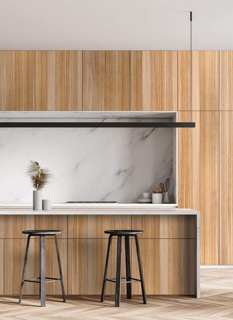 Kitchen featuring Plyco's raw NFG Blackbutt Laminato veneer laminate on a white background