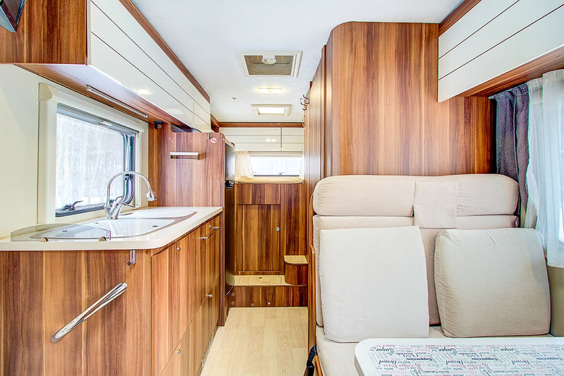 Wide shot of a mobile home interior displaying Plyco's Vanply caravan wall panel products