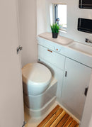 Bathroom in a RV / Caravan featuring 3mm Buckskin Vanply for interior caravan wall panels and cabinets from Melbourne plywood supplier Plyco without a white background