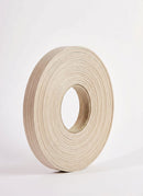 Plyco's 100m x 23mm x 1mm Unglued ABS Vanply Edging in Morella Oak on a white background