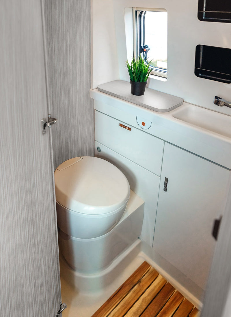 Bathroom in a RV / Caravan featuring 3mm Grey Fineline Vanply for interior caravan wall panels and cabinets from Melbourne plywood supplier Plyco without a white background