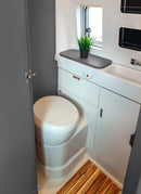 Bathroom in a RV / Caravan featuring 3mm Java Vanply for interior caravan wall panels and cabinets from Melbourne plywood supplier Plyco without a white background