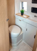 Bathroom in a RV / Caravan featuring 3mm  Valencia Oak Vanply for interior caravan wall panels and cabinets from Melbourne plywood supplier Plyco without a white background