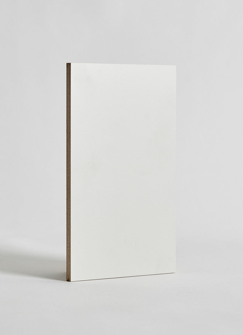 Plyco's Cloud Decor Laminate pressed onto a Birch Plywood core (Decoply) on a white background