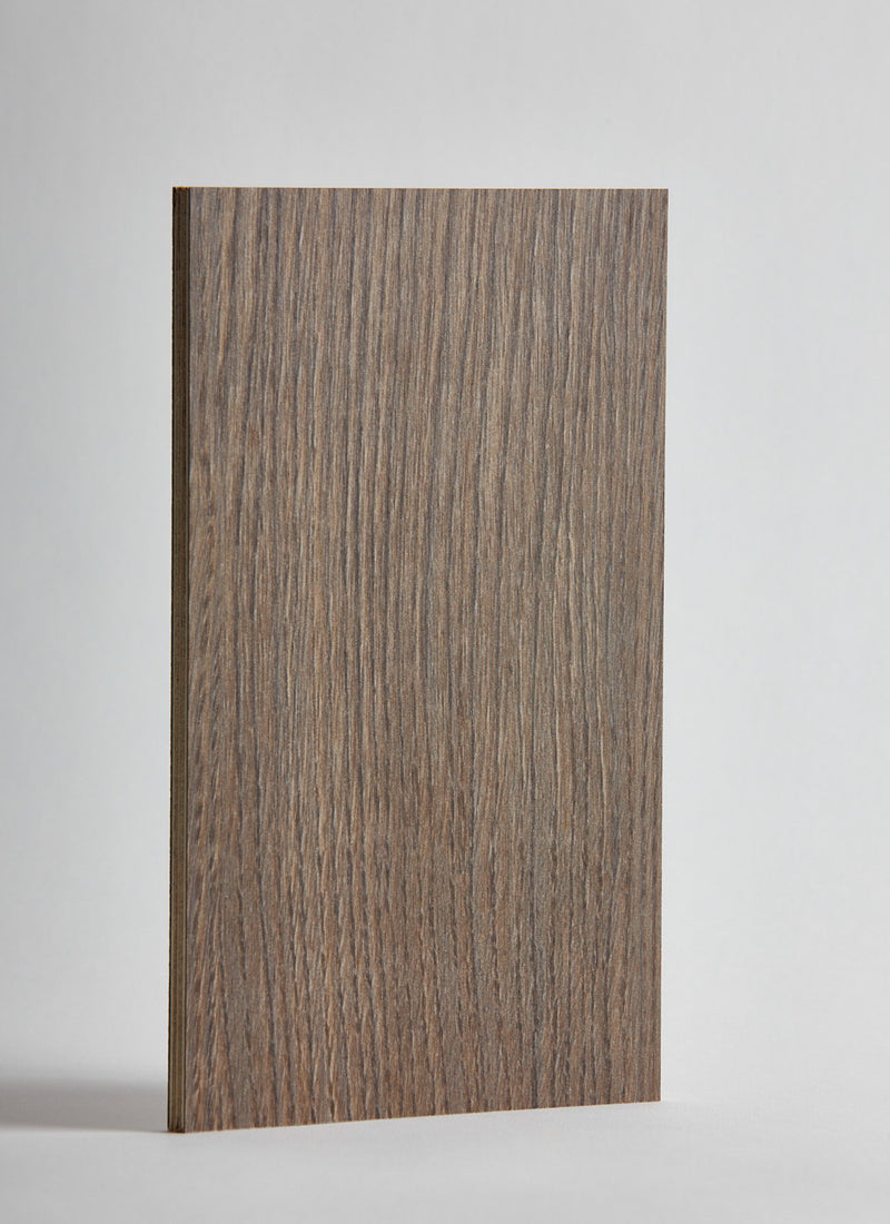 Plyco's Graphite Oak Decor Laminate pressed onto a Birch Plywood core (Decoply) on a white background