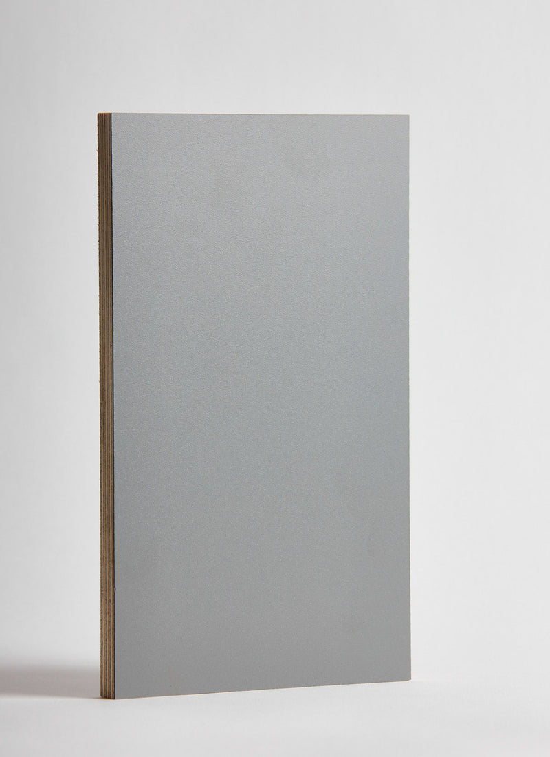 Plyco's Slate Decor Laminate pressed onto a Birch Plywood core (Decoply) on a white background