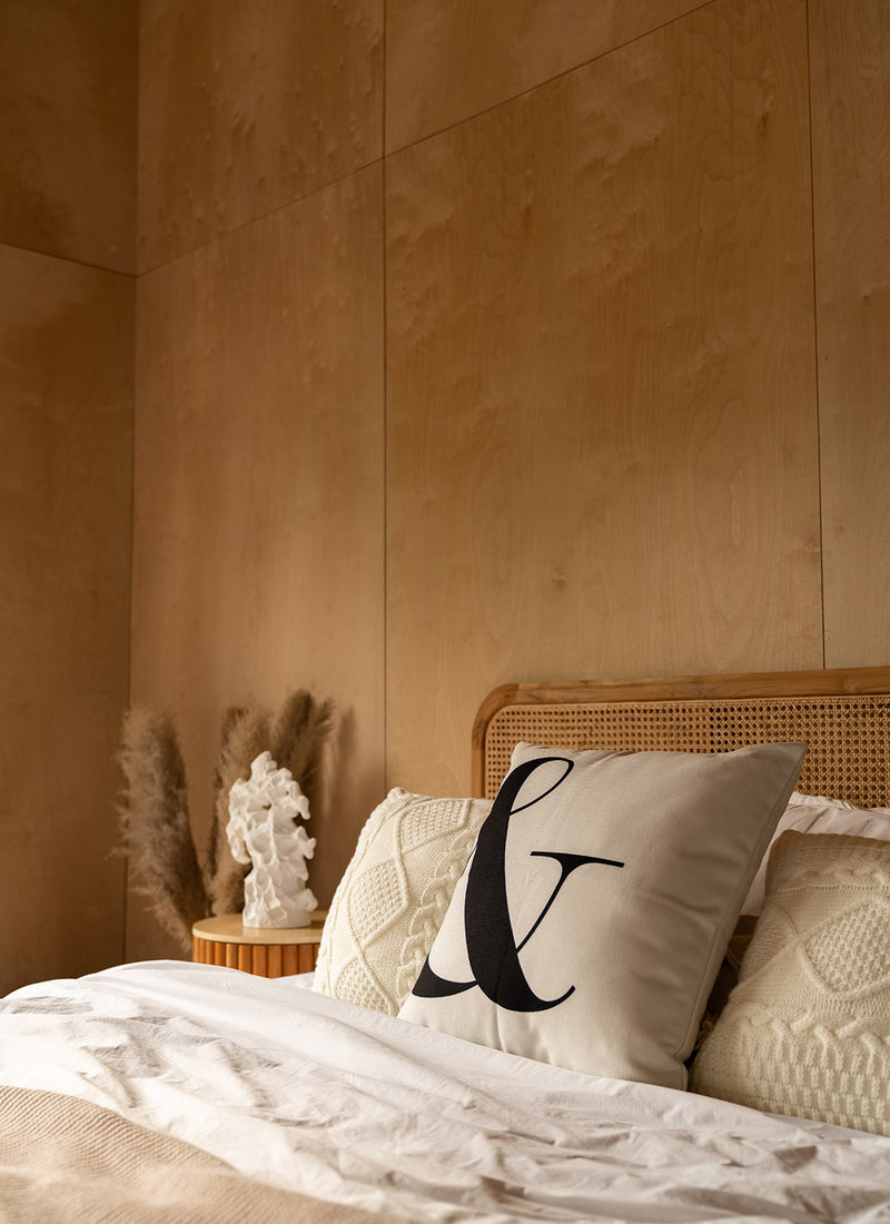 Plyco's 12mm Premium European Birch Plywood used as bedroom wall panels without a white background