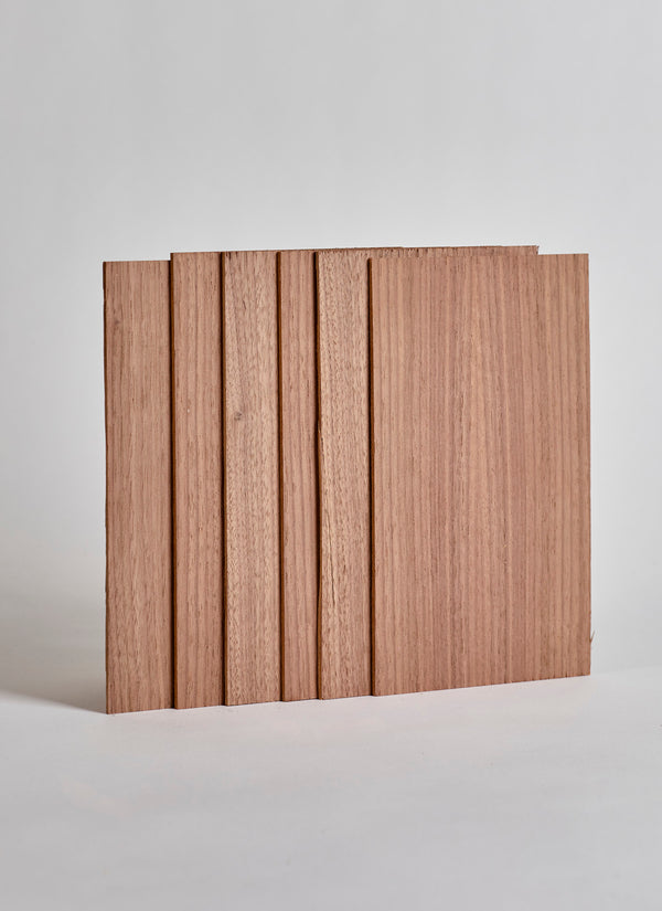 Plyco's 2.5mm American Walnut Laserply Craft Pack, containing six sheets, on a white background