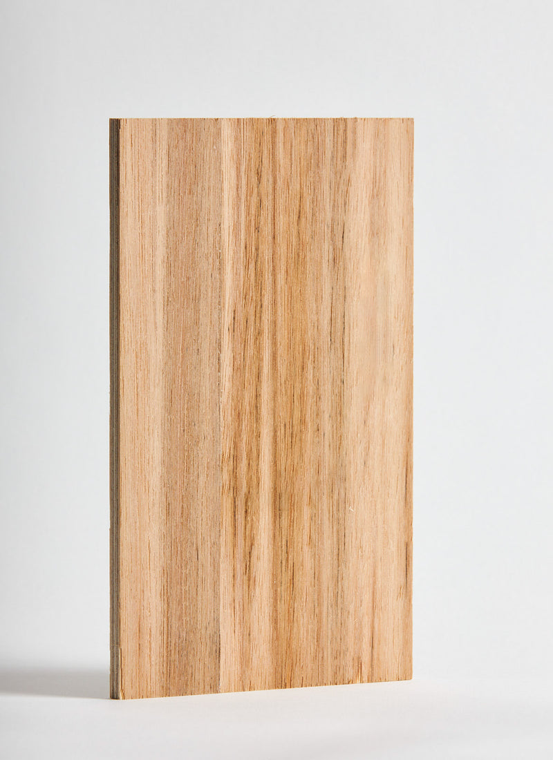 Plyco's NFG Blackbutt timber veneer on Birch 12mm Quadro plywood panel on a white background