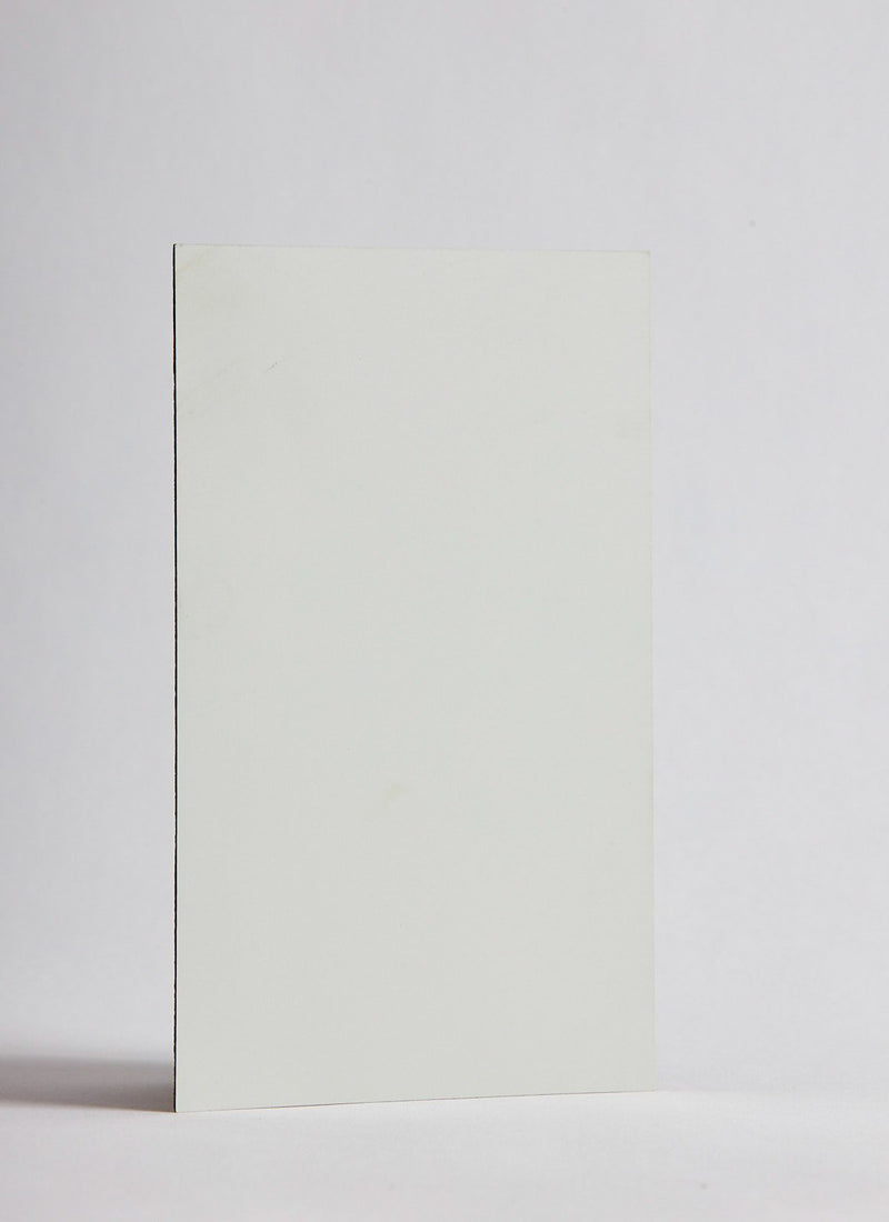 Plyco's raw 1mm Pewter Spotless Laminate on a white background