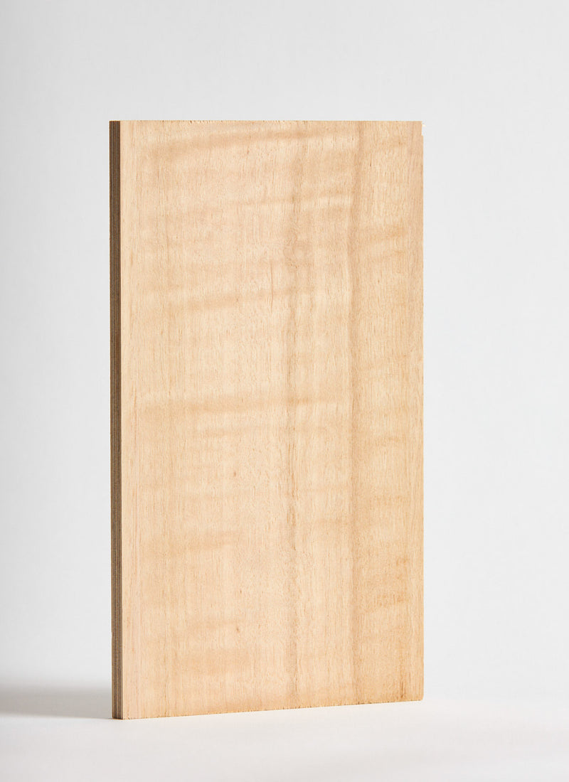 Plyco's Tasmanian Figured Eucalypt Strataply pressed on 18mm Birch Plywood on a white background
